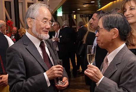 Ohsumi (left) with Dr. Tadaharu Tsumoto, director of JSPS Stockholm Office