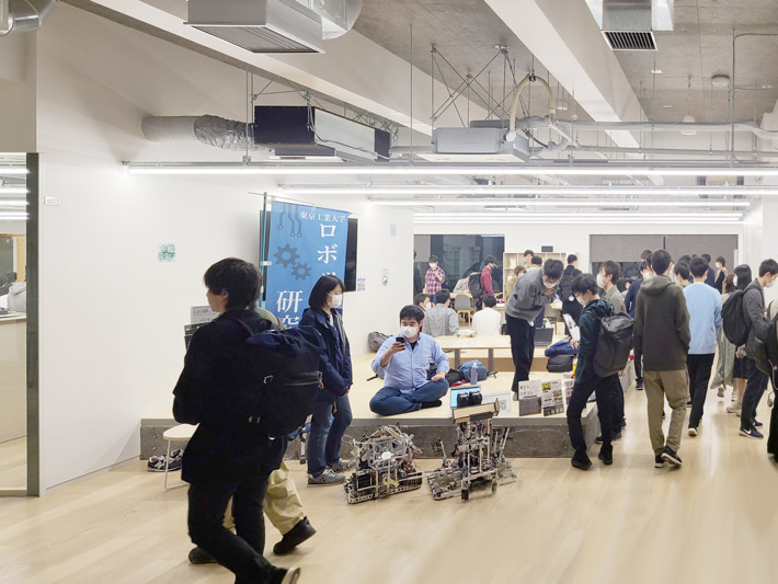 Participants visiting student club booths