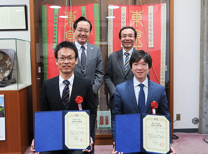 (counterclockwise from front left) Kitano, Inagi, EVP for Research Osamu Watanabe, President Kazuya Masu