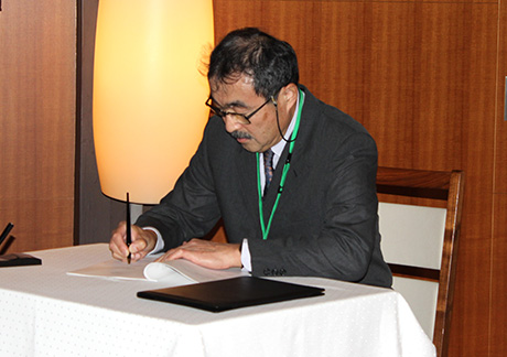 Executive Vice President Ando at signing ceremony