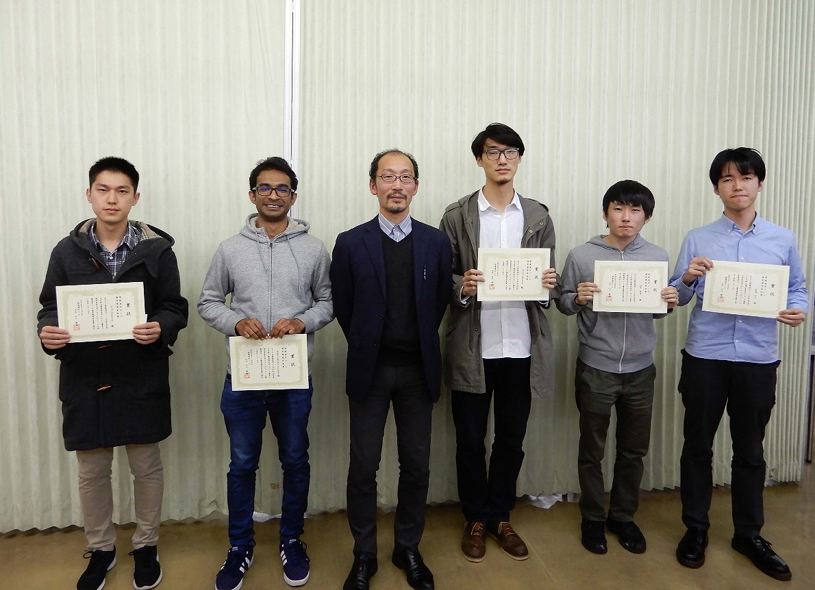 The awards ceremony was held at the Ookayama campus. From the left to the right in the photo: Mr. Muneyuki Sato, Mr. Anushka Wijesundara, Prof. Masahiro Yamaguchi, Mr. Maodong Xiang, Mr. Tomohiro Tanaka, and Mr. Naoto Soga.