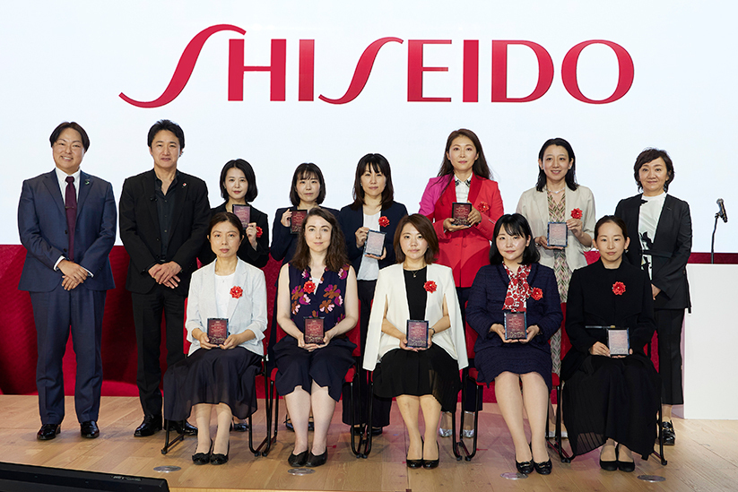 Recipients of the award at the plaque presentation ceremony on July 6, 2023(Associate Professor Katie Seaborn, front row, second from left.)