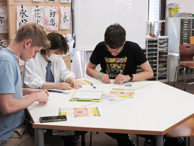 Participants working on origami