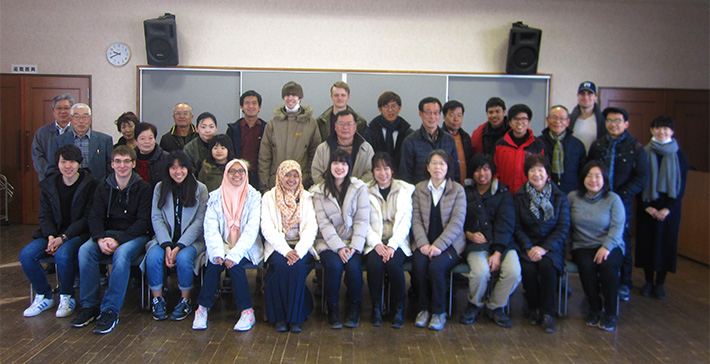 Group photo with homestay family members