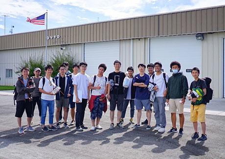 Teams after breakfast meeting with Assoc. Prof. Hiroki Nakanishi (center, black shirt)